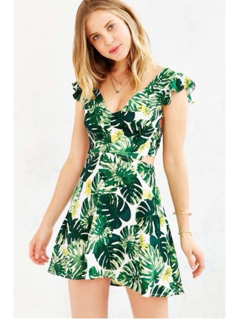 For Love & Lemons white and green tropical leaf print mini dress.